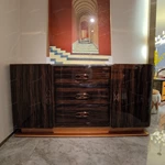 Marble-Top Sideboard Cabinet with Dark Striped Wood Veneer, Rounded Side Doors, and Central Drawer Storage